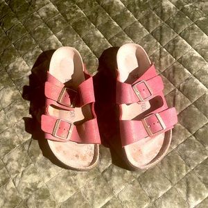 Sparkly red Birkenstocks. Worn 3 times. I like tennies better.